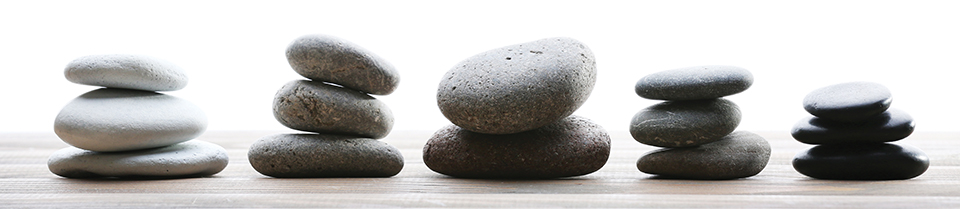 Image of stones used in Hot Stone Therapy. Use of the stones enhances the effectiveness clinical massage in certain circumstances